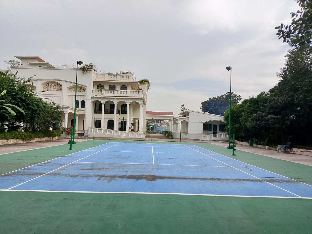 Tennis Court Mansion Backdrop at Bulbul Event Spaces